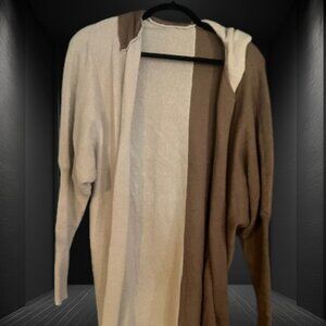 A 2-Tone, Color-Block Hooded Cardigan.